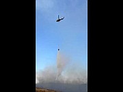 Video of a helicopter dropping water on the Tunk Block Fire. Submitted by Mark Todtentude.